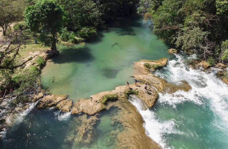 By Luis Enrique  Pola Alejandro; A day of exploration in the beautiful blue water waterfalls in Chiapas. Mexico